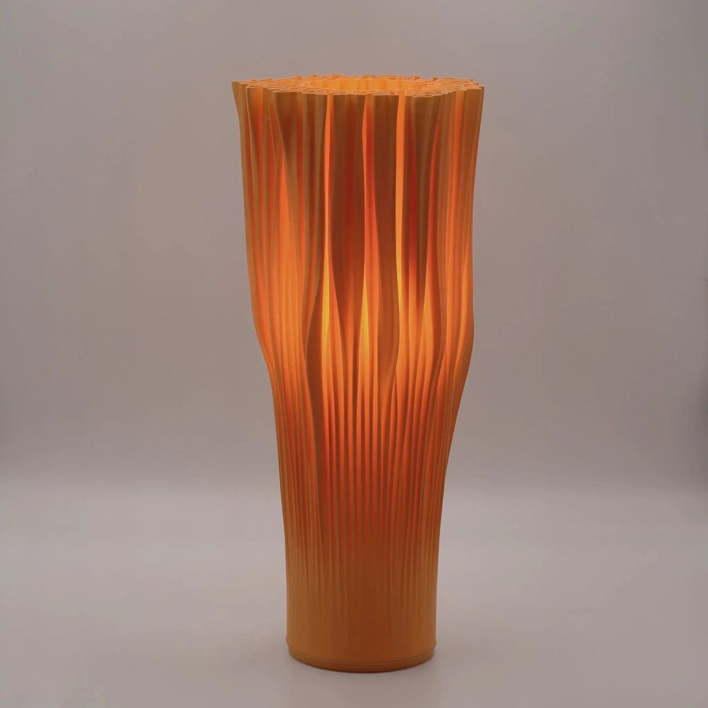 Sculptural coral-inspired lamp with warm light diffusion with orange color