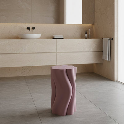 Pink Dune Side Table by Namami Studio in a modern bathroom setting