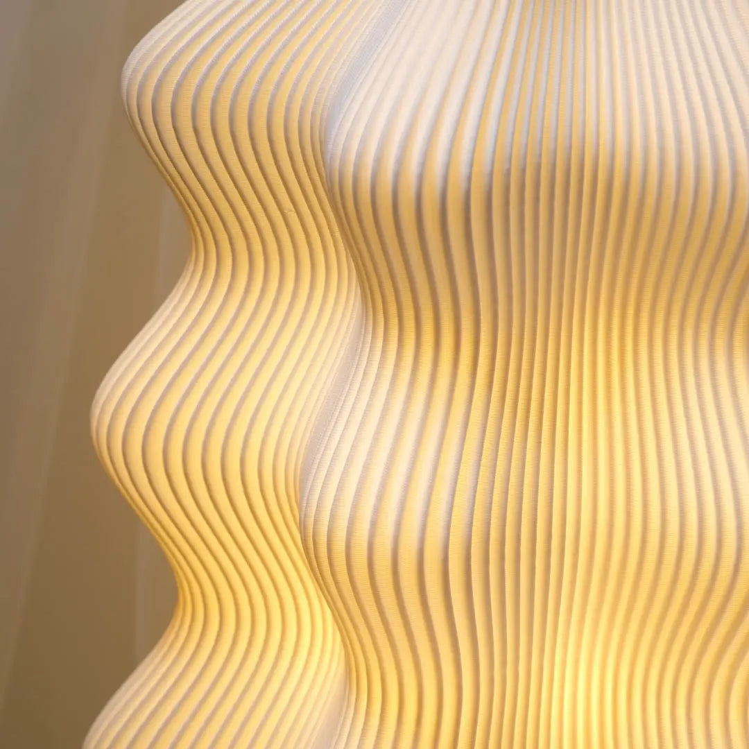 Harp Lamp Namami, Harp Lamp beside sofa – artistic lighting solution