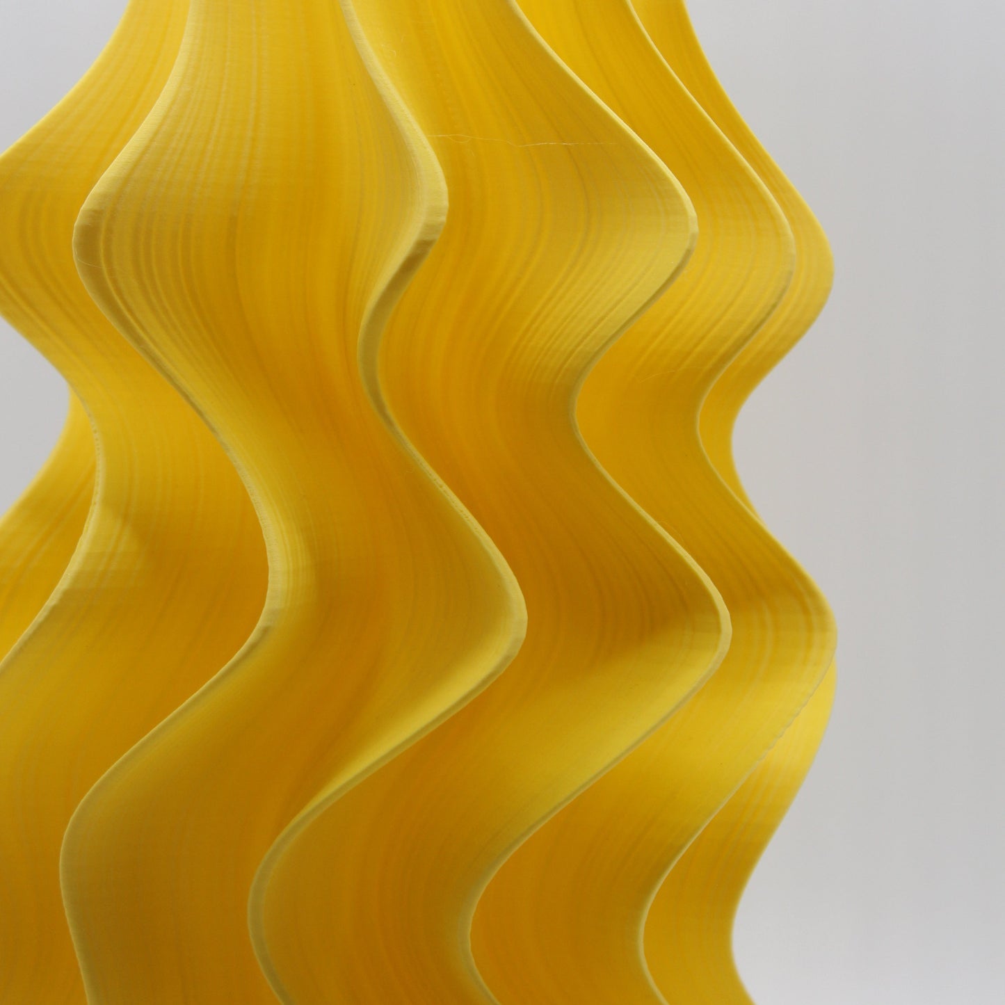 Yellow wavy pattern on a white background