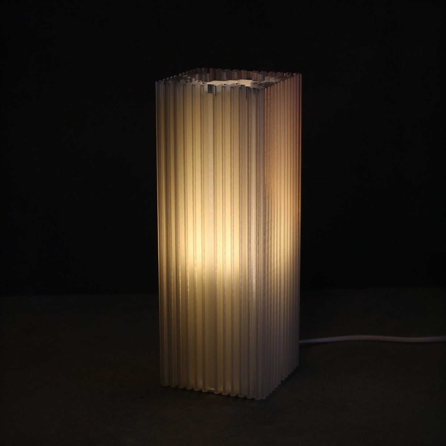Modern designer lamp with translucent shell and removable internal diffuser for soft ambience
