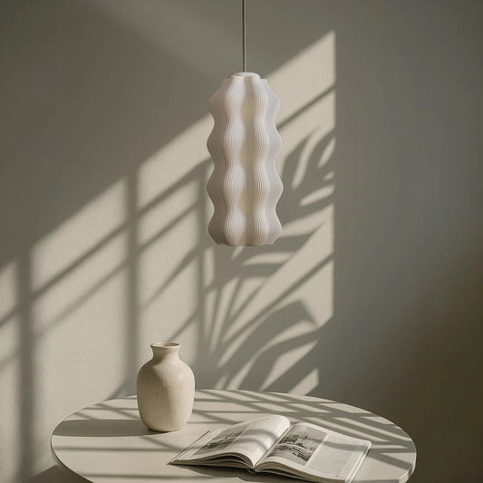 Harp Pendant Lamp hanging in a dining room over a wooden table