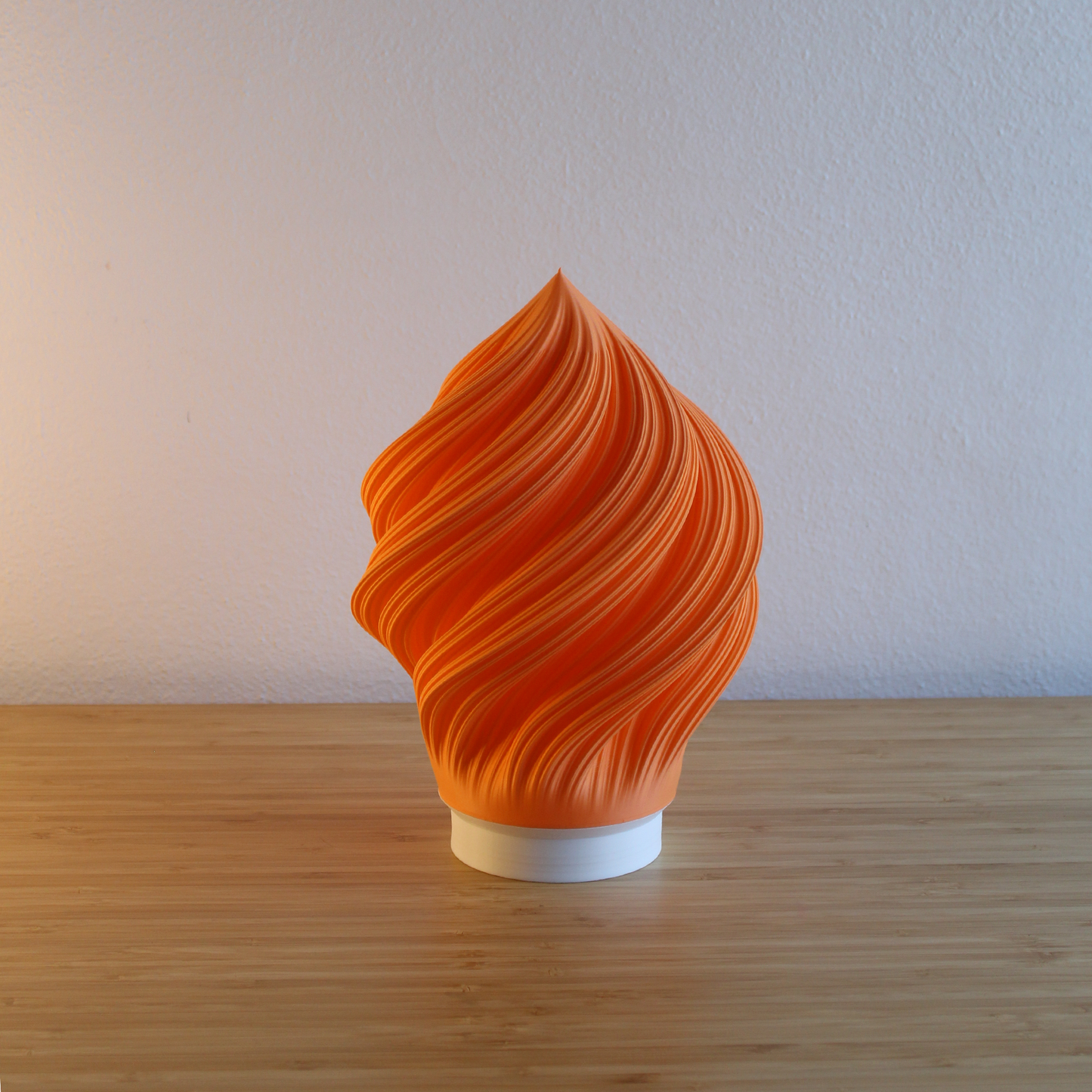 Whimsical Portable Soft Serve Lamp, recycled PLA. Cordless, 80-hour battery, dimmable 3000K LED. A cheerful, sustainable lighting solution.