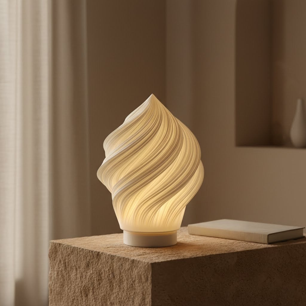 Portable Soft Serve Lamp on a wooden bedside table in a cozy bedroom, casting a soft, dimmable light. Highlights cordless convenience and warm ambiance.