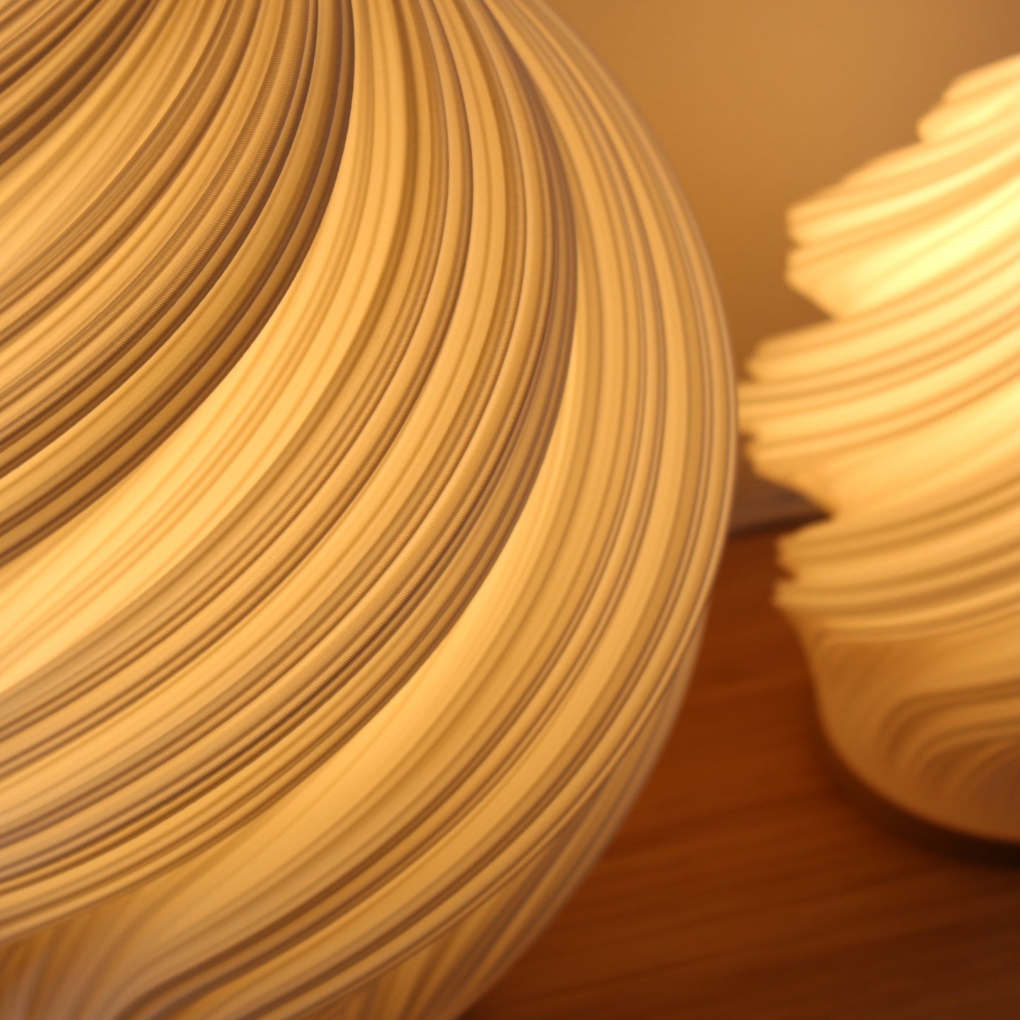 Minimal Scandinavian style 3D printed lamp with swirling texture, Soft Serve Lamp in white.
