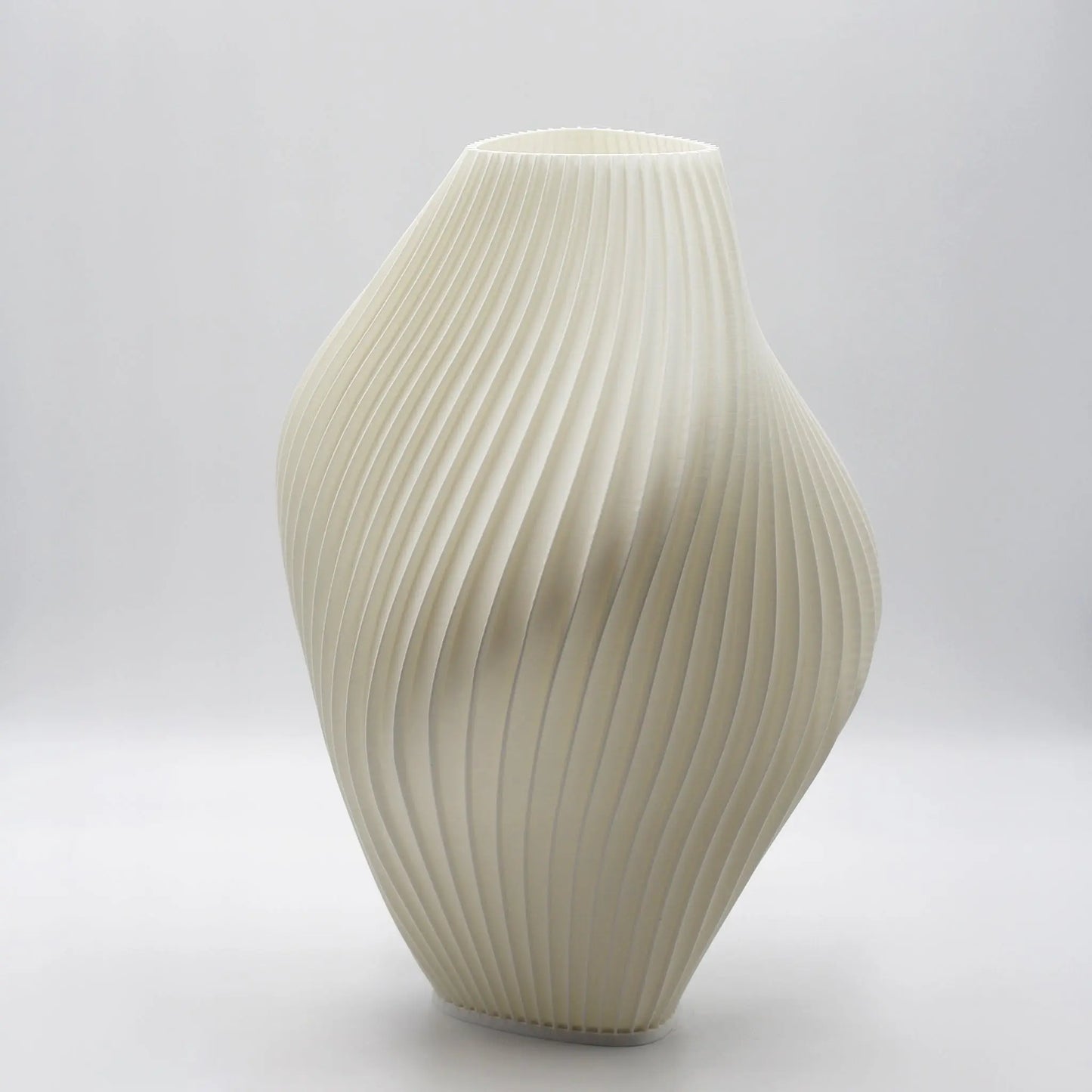 Pleat Lamp Namami, Warm glow of Pleat Lamp in minimal workspace