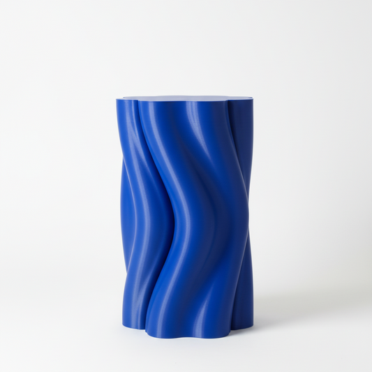 Dune Side Table in blue – sculptural modern furniture inspired by desert dunes with flowing curved design.
