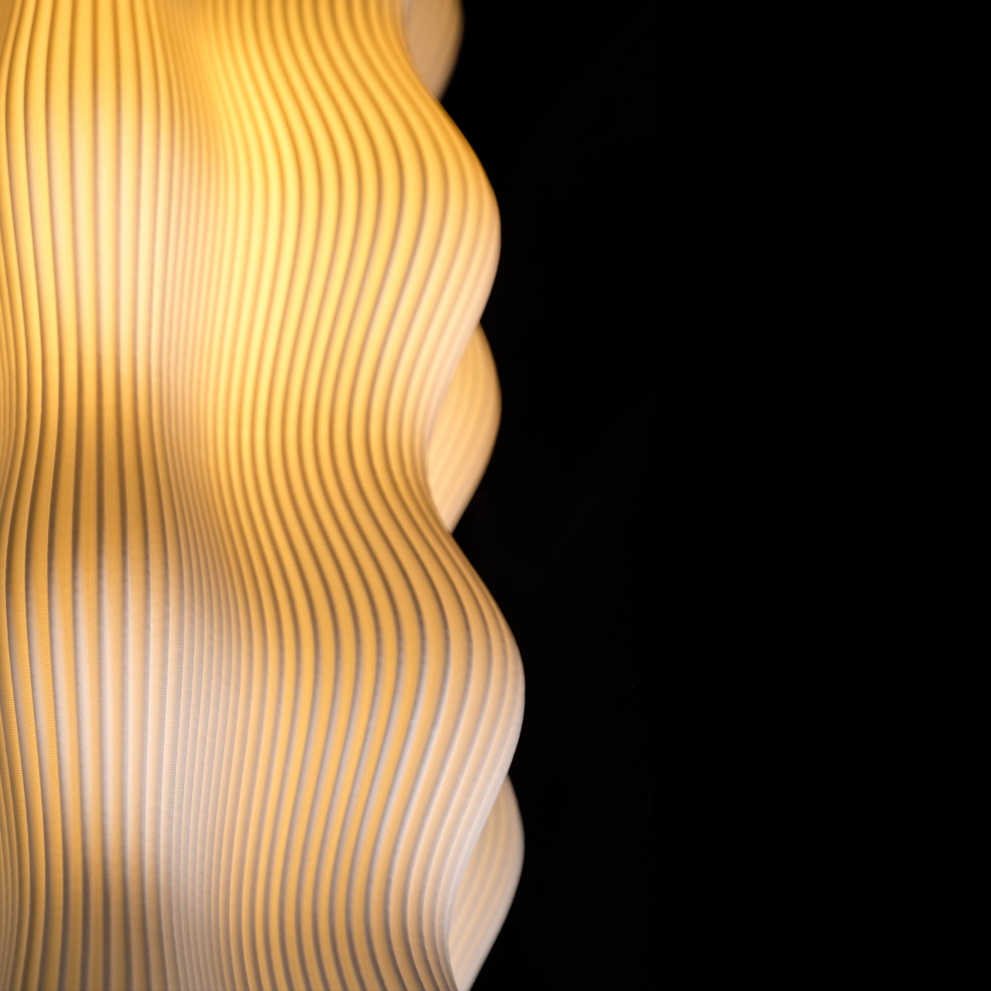 Close-up of the delicate pleated detail of the Harp lamp
