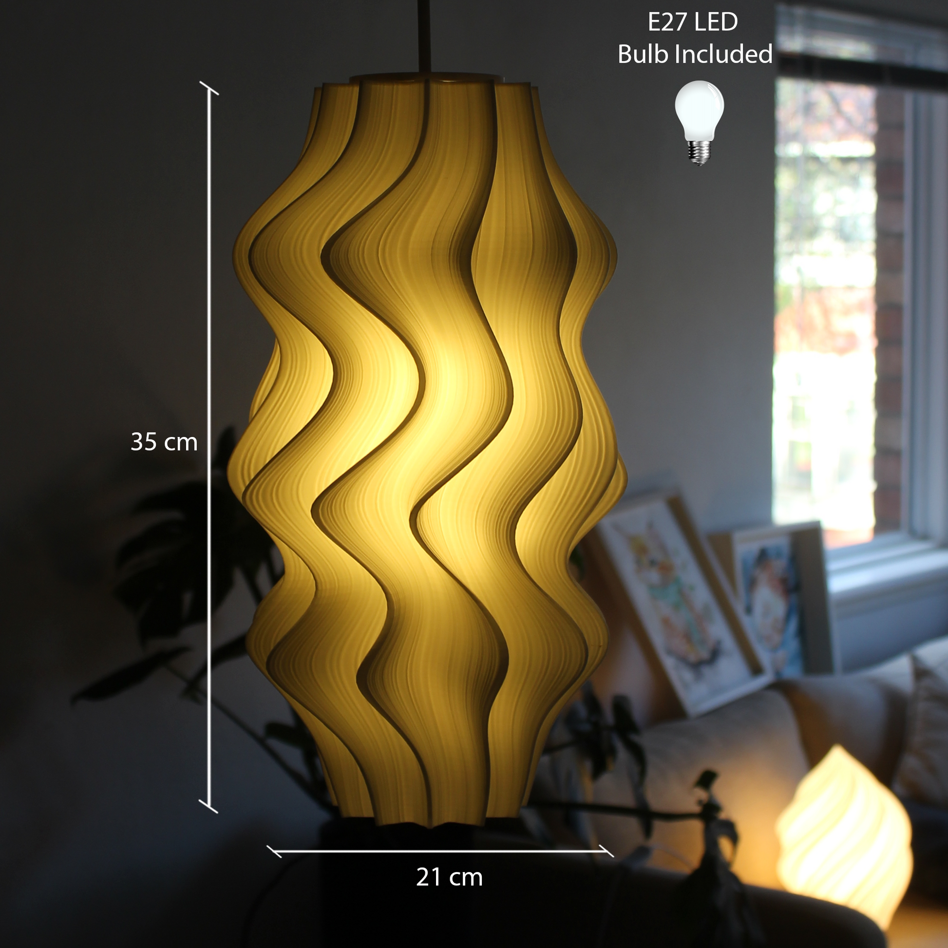 Iris-patterned lamp with measurements and bulb included text in a room setting.