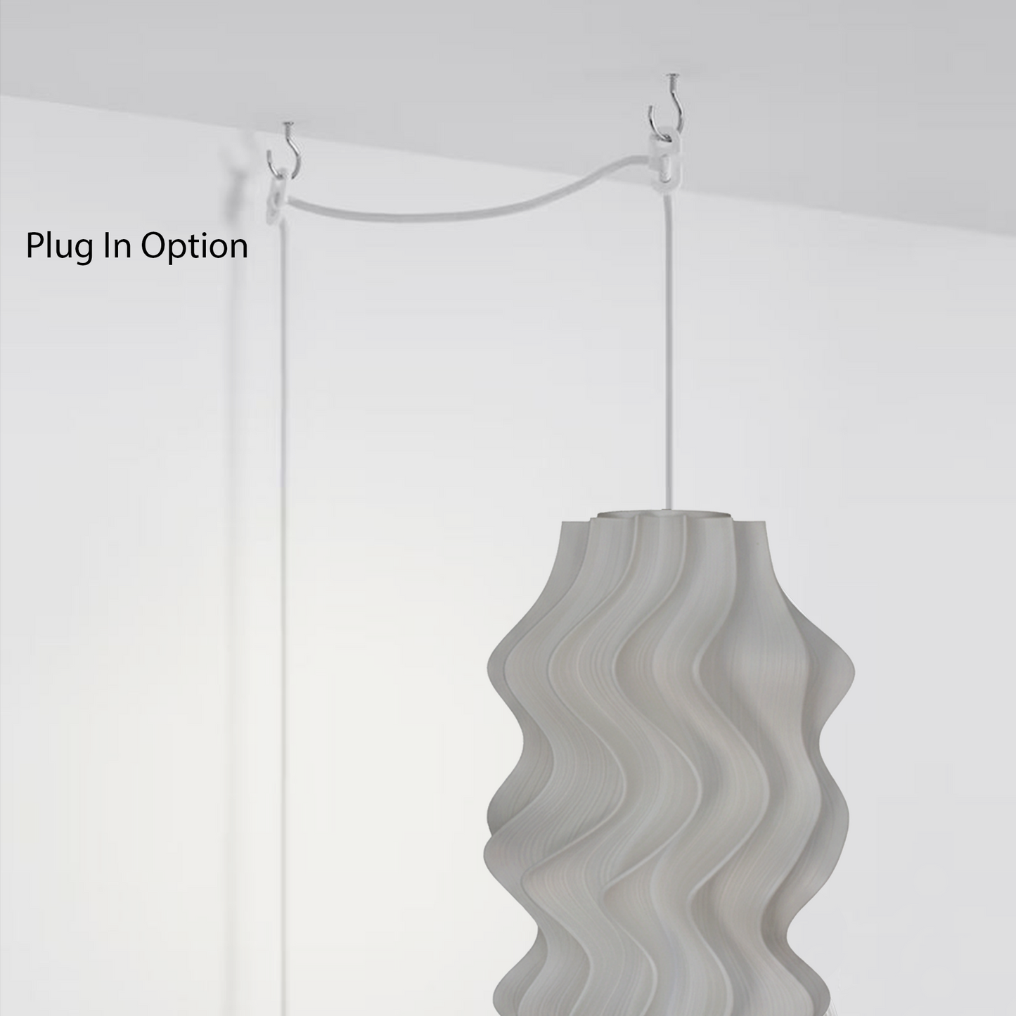 Gray Iris pendant light on a white background with 'Plug In Option' text.