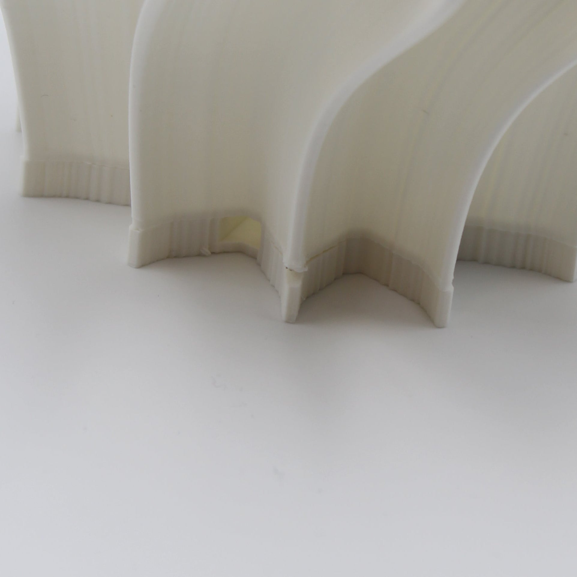 Wavy Iris creme lamp on a white background