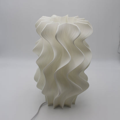 Iris White wavy lampshade on a plain background