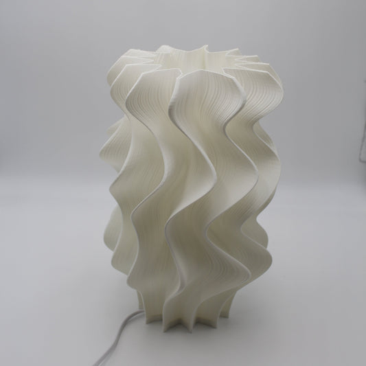 Iris White wavy lampshade on a plain background