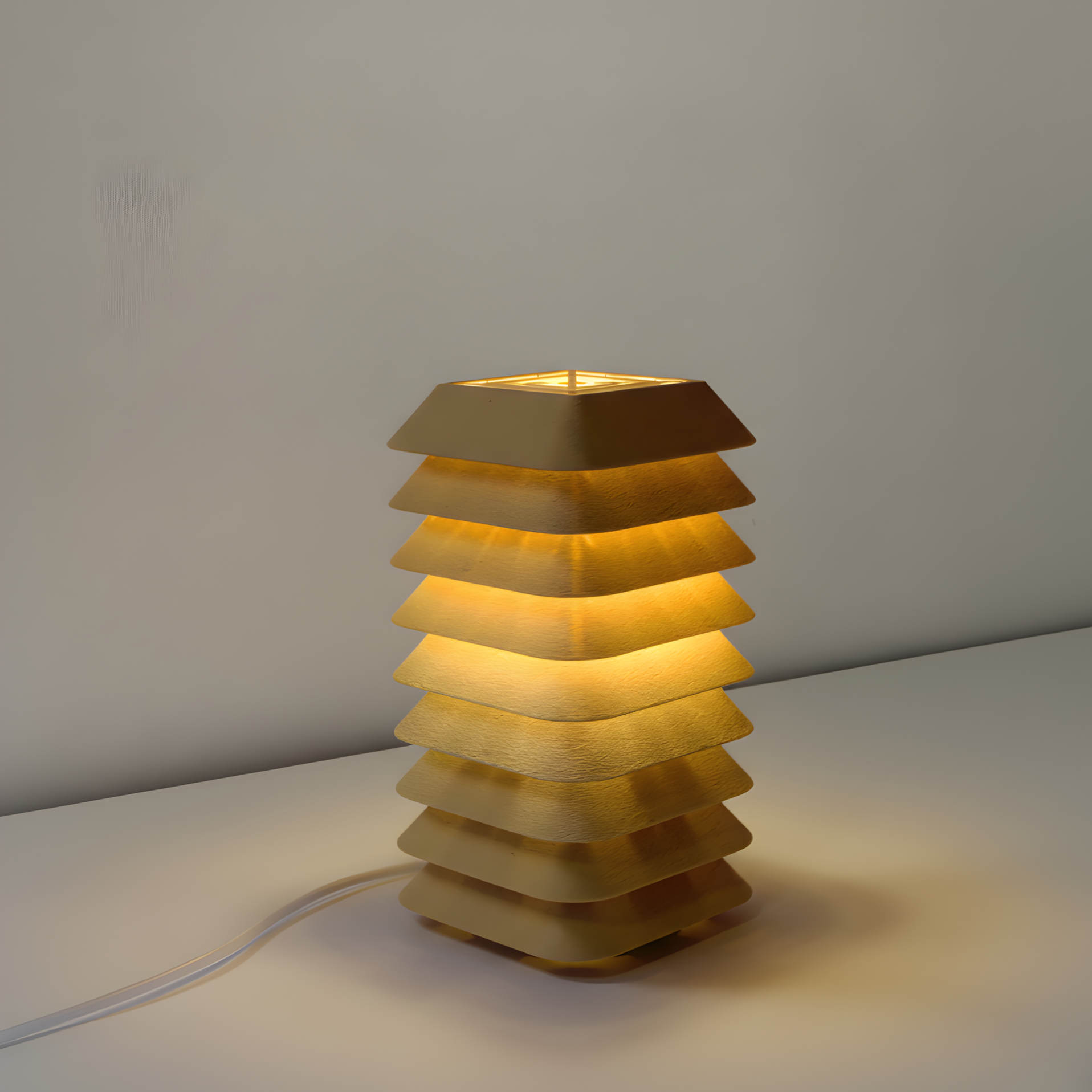 Kengo Tō lamp on a neutral background, highlighting its sculptural tower form and soft illumination.