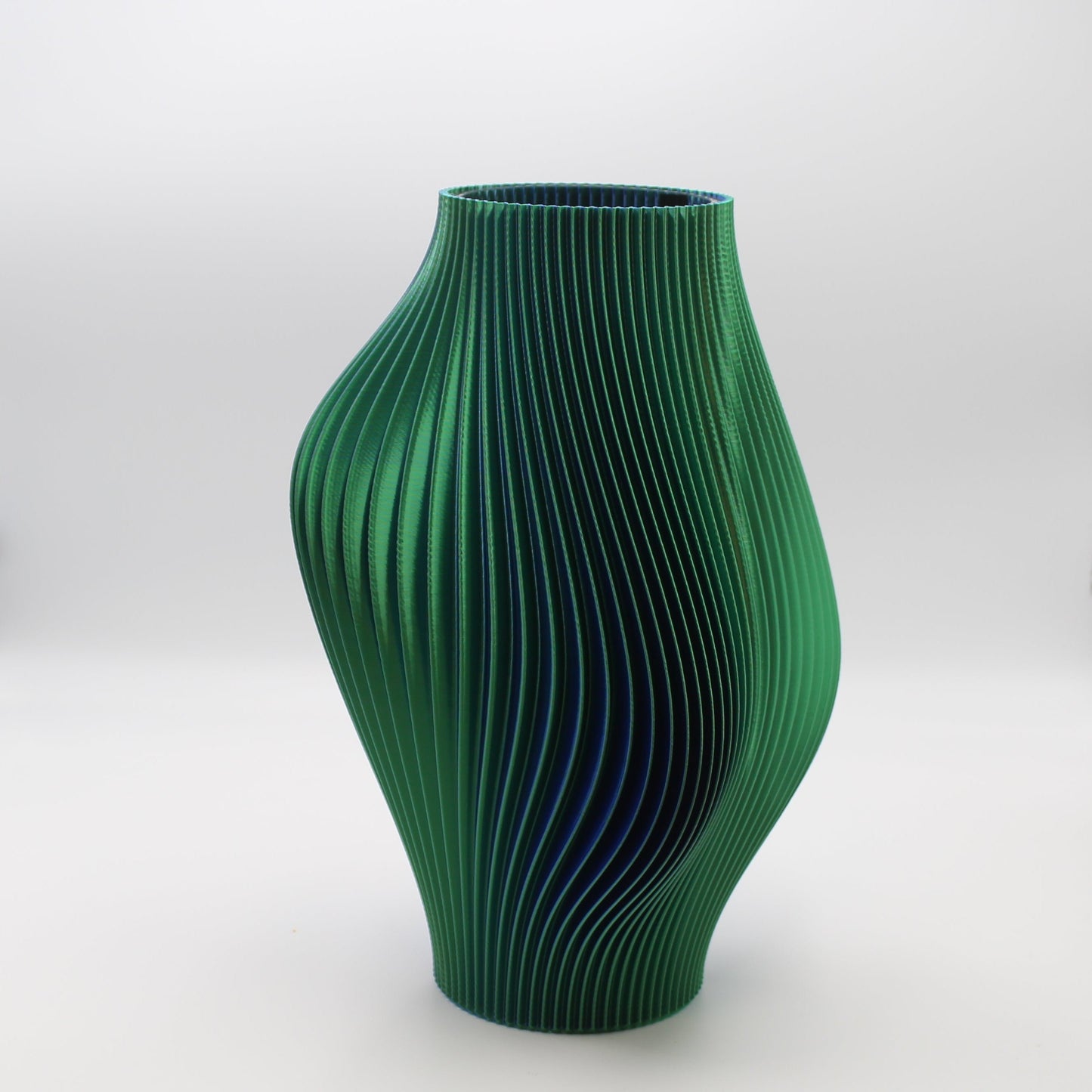 Green textured Ripple vase on a white background