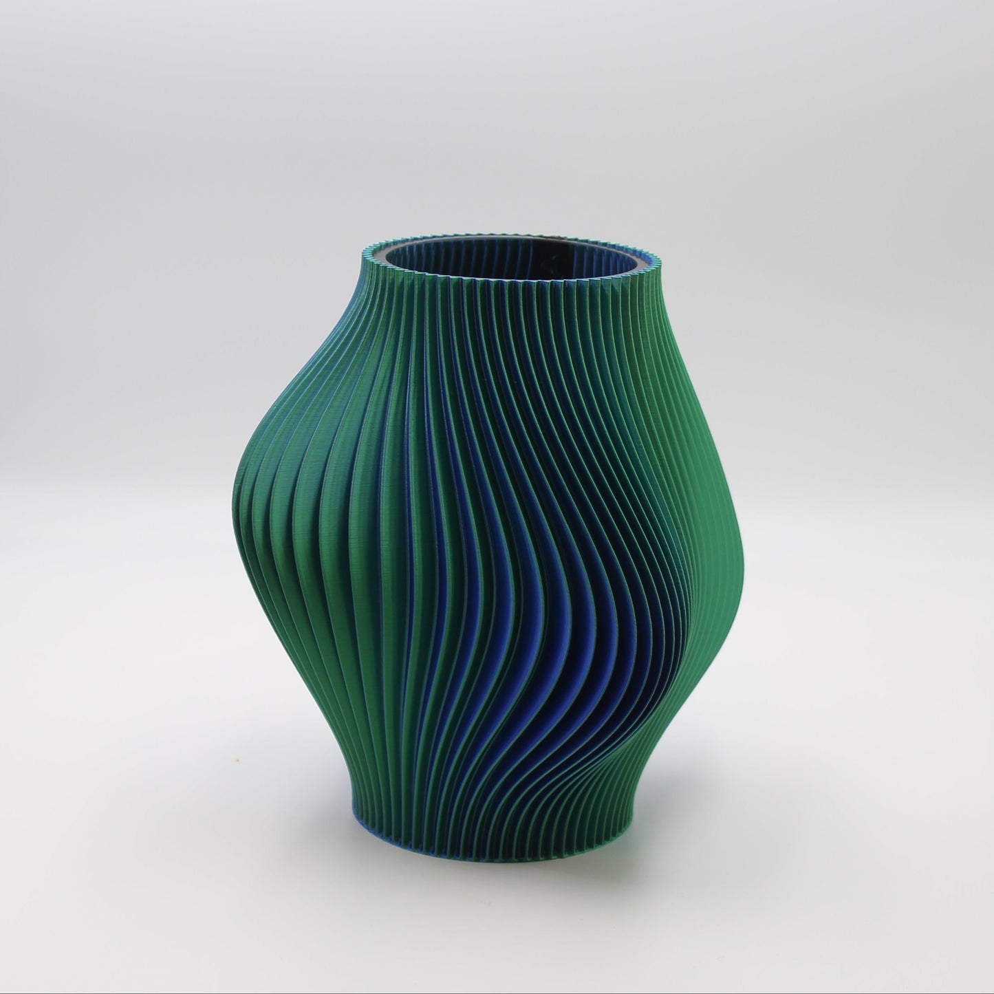 Namami Ripple Green textured vase on a white background
