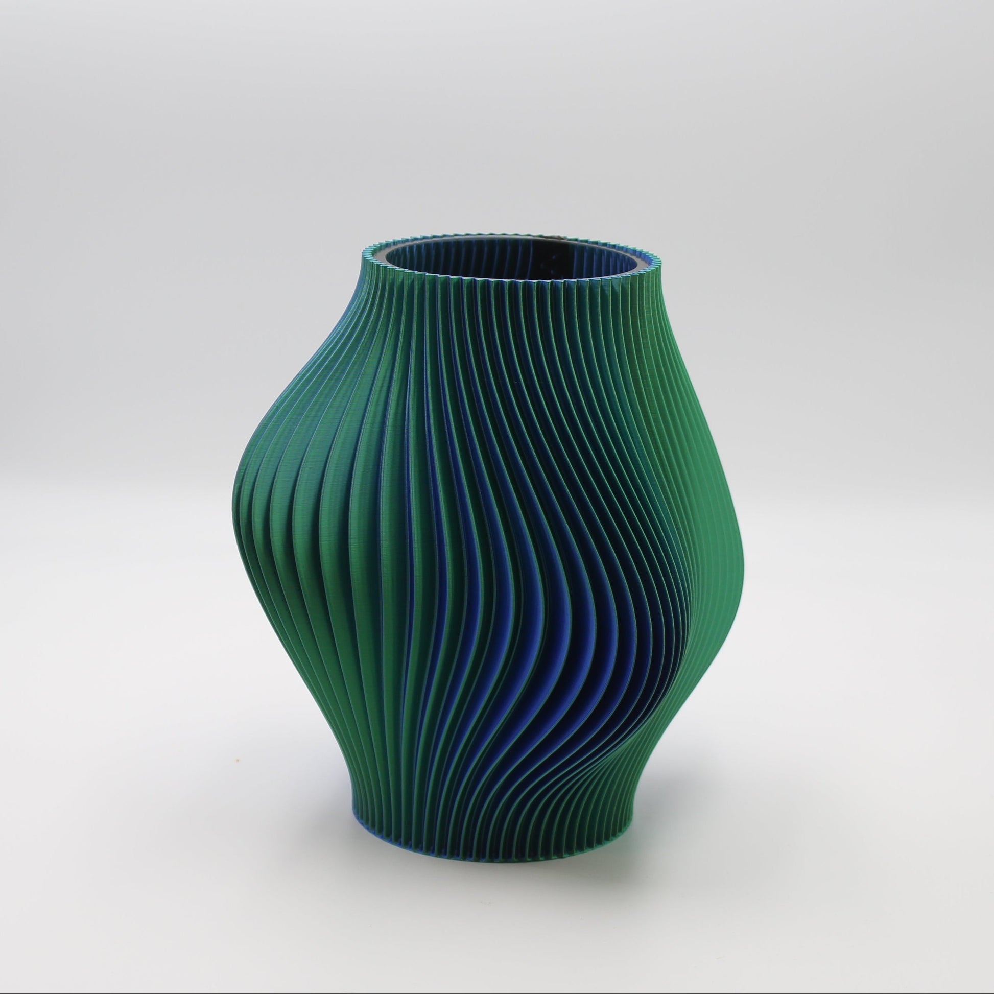 Namami Ripple Green textured vase on a white background