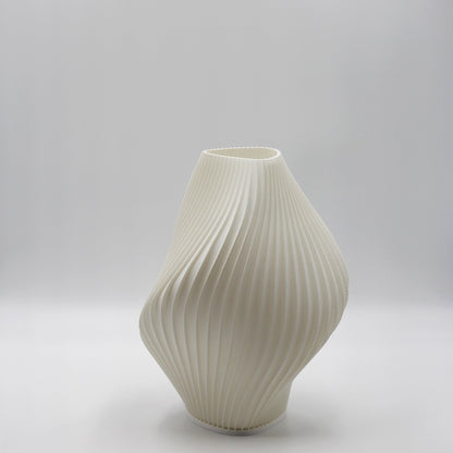 White ribbed pleat lamp on a light gray background