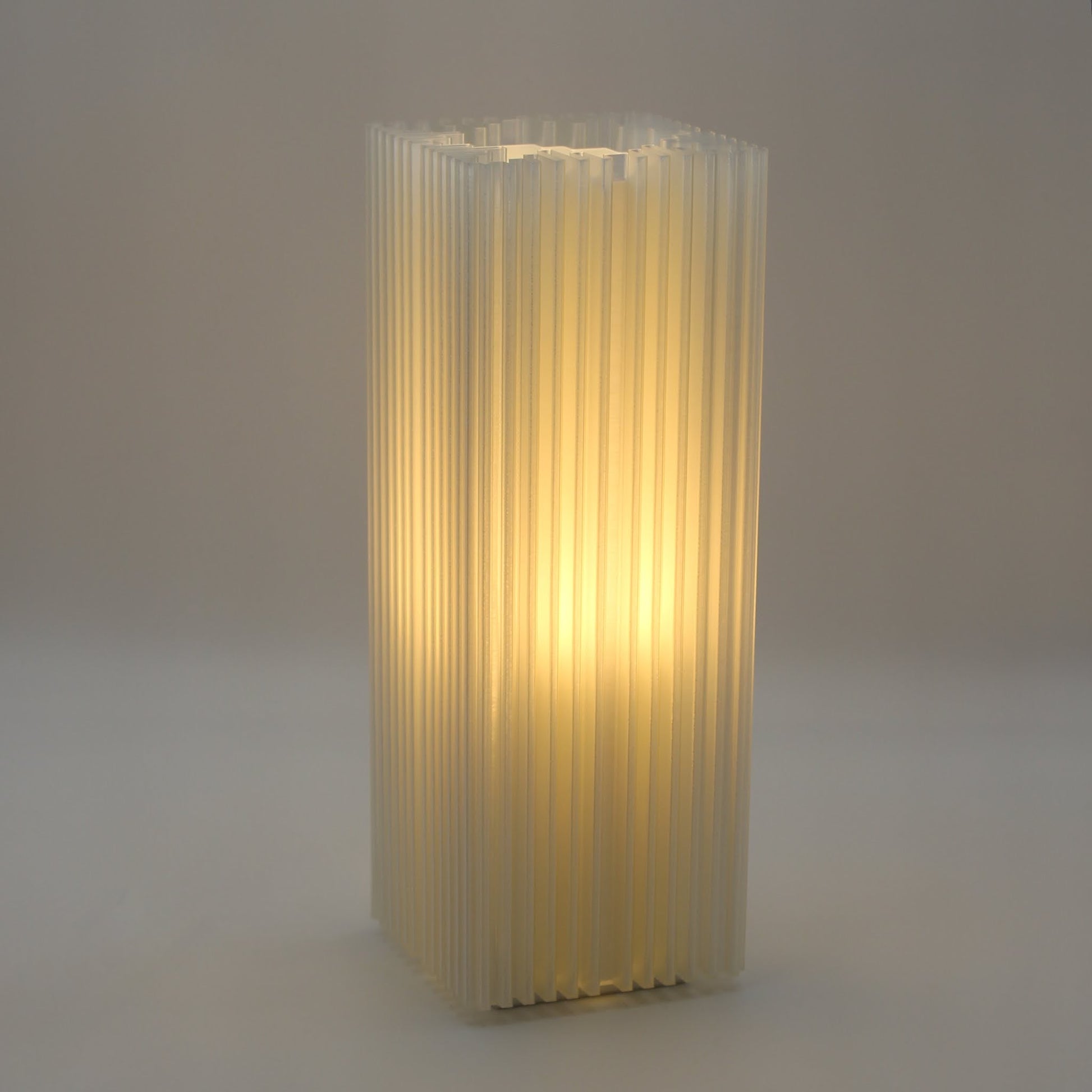 Close-up of ridged shard-like texture of lamp, diffusing light through translucent PLA shell