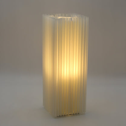 Close-up of ridged shard-like texture of lamp, diffusing light through translucent PLA shell