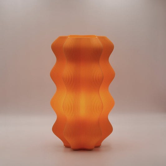 Orange textured Namami Studio Harp on a neutral background