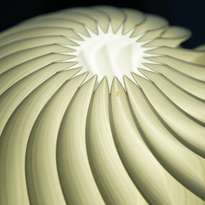 Close-up of small top-surface misprint on Crème Orb Studio Seconds lamp