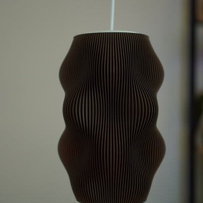 Close-up of Chocolate Harp Echo pendant Studio Edition SE002 switched off