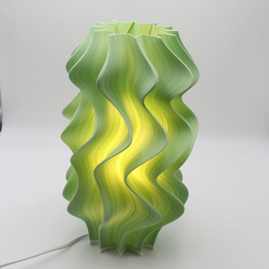 A close-up of a Pistachio Iris lamp, a unique offcut with a clean, cropped top edge.