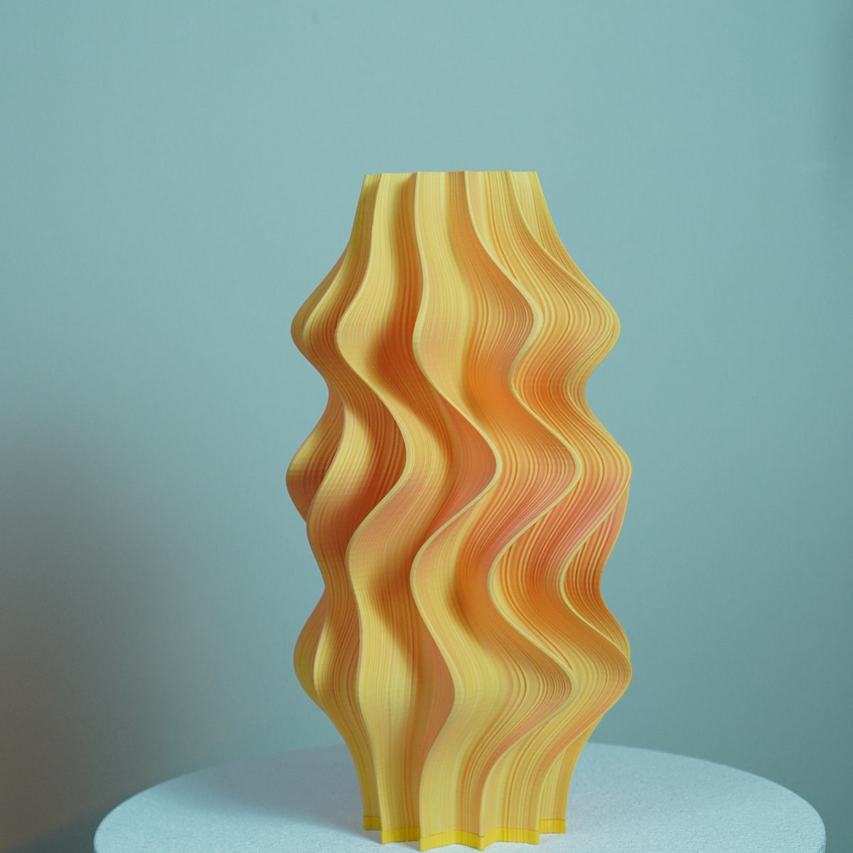 Iris Dual Colour table lamp from its yellow-facing side