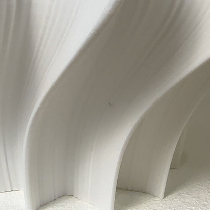 Crème Iris floor lamp, close-up of tiny black dots near the bottom