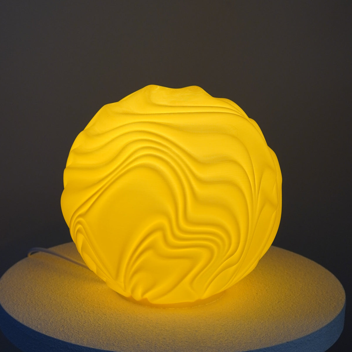 Leora O4 Flow Sculpted Lamp in Lemon illuminated, printed by Namami Studio