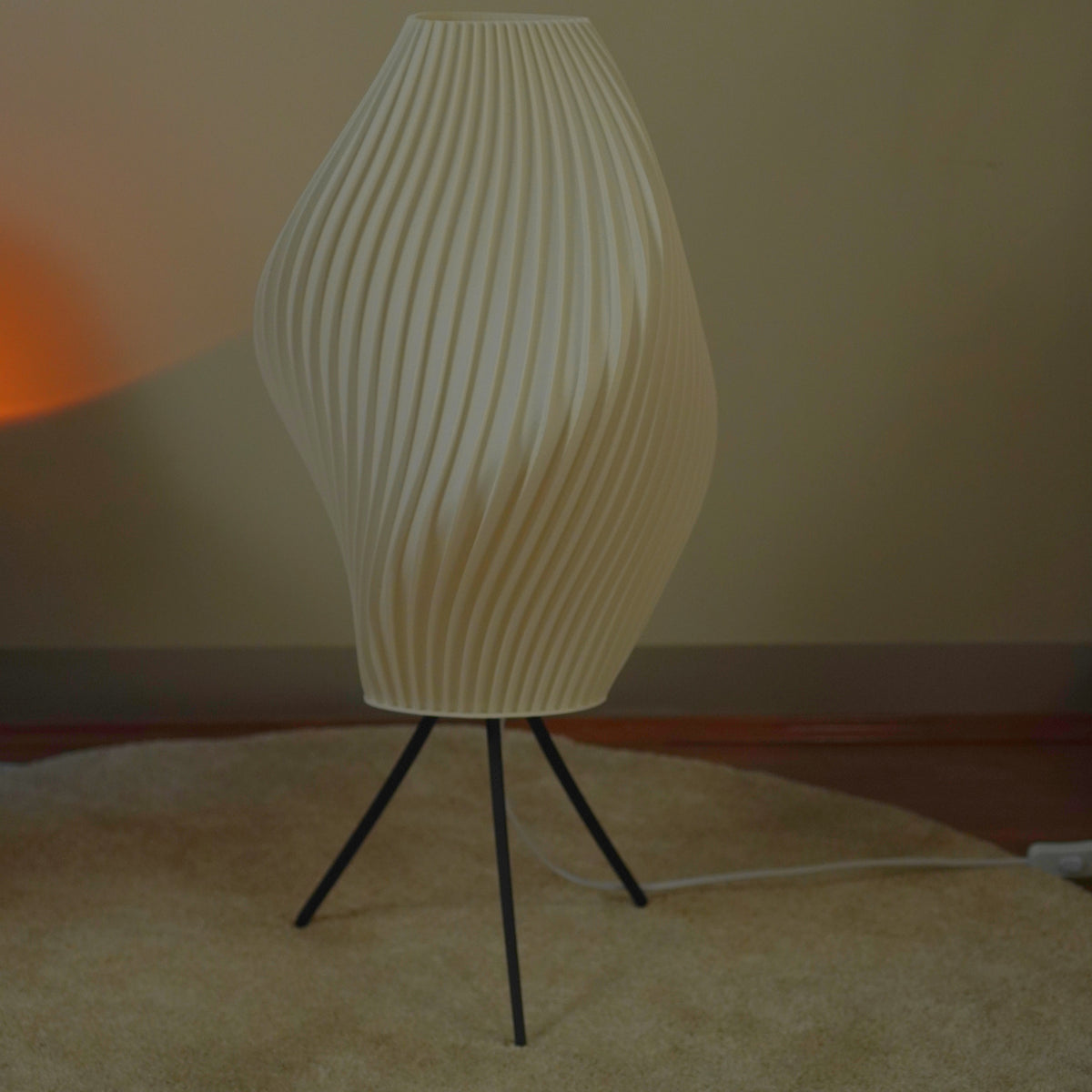 Crème Pleat Floor Lamp switched off, showing the natural shade colour and curved pleats on a black tripod.